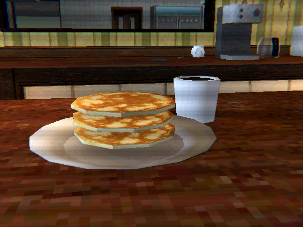 A stack of three pancakes on a plate at the cafe counter, with a cup of coffee behind it
